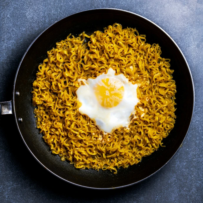 brown rice on black frying pan